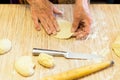 Making cabbage pies of dough