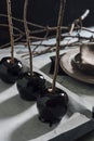 Making caramel black apples, on the cooling tray Royalty Free Stock Photo