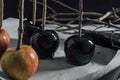 Making caramel black apples, on the cooling tray Royalty Free Stock Photo