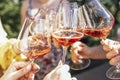 Making a celebratory toast with sparkling wine. Female hands holding glasses of champagne Royalty Free Stock Photo