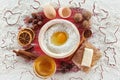 Making christmas cookies - ingredients on the red table Royalty Free Stock Photo