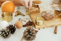 Making christmas gingerbread cookies. Gingerbread dough with festive golden metal cutters on wooden board with flour, cooking Royalty Free Stock Photo