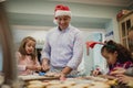 Making Chritmas Biscuits With Dad Royalty Free Stock Photo