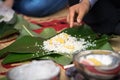 Making Chung cake by hands closeup, Chung cake is the most important traditional Vietnamese lunar New Year Tet food.