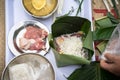 Making Chung cake by hands closeup, Chung cake is the most important traditional Vietnamese lunar New Year Tet food.