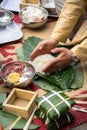 Making Chung cake by hands closeup, Chung cake is the most important traditional Vietnamese lunar New Year Tet food.