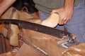 The making of clogs, a traditional Dutch craft of making wooden traditional shoes Royalty Free Stock Photo