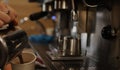 Making coffee barista, making coffee on a professional coffee machine Royalty Free Stock Photo