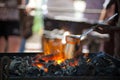 Making coffee in the Cezve on the flaming coals Royalty Free Stock Photo