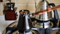 Making coffee in dzhezva on a gas stove Royalty Free Stock Photo