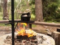 Making coffee outdoors in a kettle over open fire