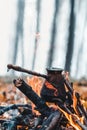 Making coffee at the stake. Make coffee or tea on the fire of nature. Burned fire. A place for fire. Royalty Free Stock Photo