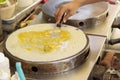 Making crepe banana chocolate crispy pancake Royalty Free Stock Photo