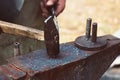 Making a decorative element in the smithy on the anvil Royalty Free Stock Photo