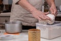 Making dough by male hands at home in kitchen Royalty Free Stock Photo