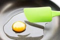 Making eggs in a saucepan and ladle Royalty Free Stock Photo