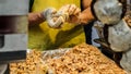 Making Eomuk, Korean street food. Fried fish cake, sausage in Se Royalty Free Stock Photo