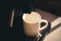 Empty white cup in coffee machine Royalty Free Stock Photo