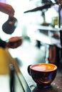 Making espresso coffee close up detail with modern machine Royalty Free Stock Photo
