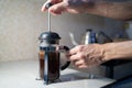 Making French Press coffee in the kitchen Royalty Free Stock Photo
