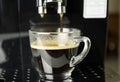Making fresh coffee on espresso machine Royalty Free Stock Photo