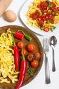 Making fresh pasta with hot arabiata sauce Royalty Free Stock Photo