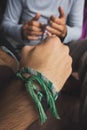 Making a friendship bracelet Royalty Free Stock Photo