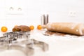 Making gingerbread cookies for Christmas in kitchen. Woman`s han Royalty Free Stock Photo