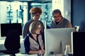 Making great work of their hard work. a group of businesspeople working late in an office. Royalty Free Stock Photo