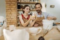 Couple of ceramists sitting at the table making their handiworks Royalty Free Stock Photo