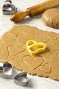 Making heart-shaped gingerbread for Valentine`s Day Royalty Free Stock Photo