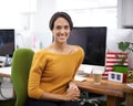 Making her mark in the creative world. Cropped view of a young designer working in the office with a smile. Royalty Free Stock Photo