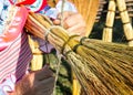 Making a home broom from sorghum branches Royalty Free Stock Photo