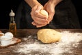 Making homemade bread. Step-by-step instruction. The cook shapes the dough. Wooden background.