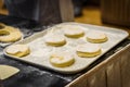 Making homemade jam doughnuts in a professional restaurant buff Royalty Free Stock Photo