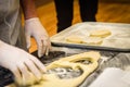 Making homemade jam doughnuts in a professional restaurant buff Royalty Free Stock Photo