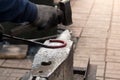 Making the horseshoe from heated red rod Royalty Free Stock Photo