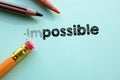 Making impossible in to possible by eraser Royalty Free Stock Photo