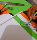 Making indian flag using orange and green colour papers for independence day celebration on August 15 Royalty Free Stock Photo