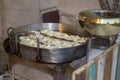 Making jalebi in frying pan with oil