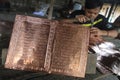 Making koran (Quran) from brass