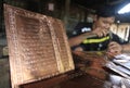 Making koran (Quran) from brass