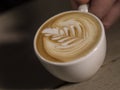 Making latte Art on a Cappucinno