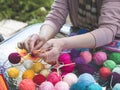 Making mandala from colored yarn and sticks. Mandala weaving