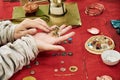 Making medieval jewelry - vintage earrings and rings. Reconstruction of the events of the Middle Ages in Europe Royalty Free Stock Photo