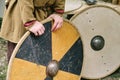 Making medieval shields made of wood and leather to protect soldiers in war. Reconstruction of the events of the Middle Ages in