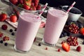 Making Mixed Berry Yogurt Smoothies Royalty Free Stock Photo