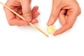 Making money. Gold coin and a brush in male hands