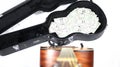 Looking down guitar neck, out of focus, case with money in distance in focus, extreme depth of field