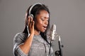 Making music beautiful black woman singing in mic Royalty Free Stock Photo